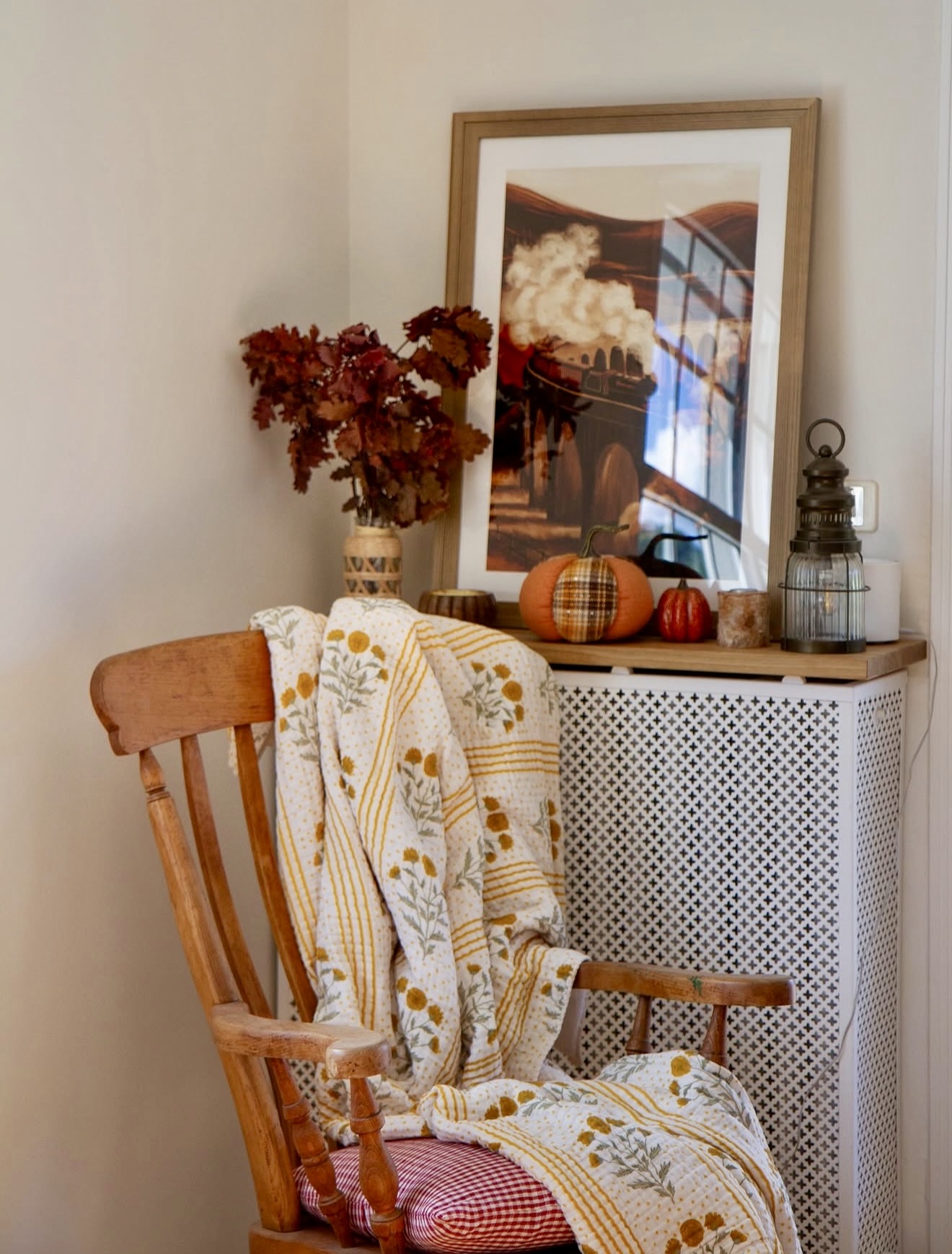 Cozy Autumn Chair With Floral Throw