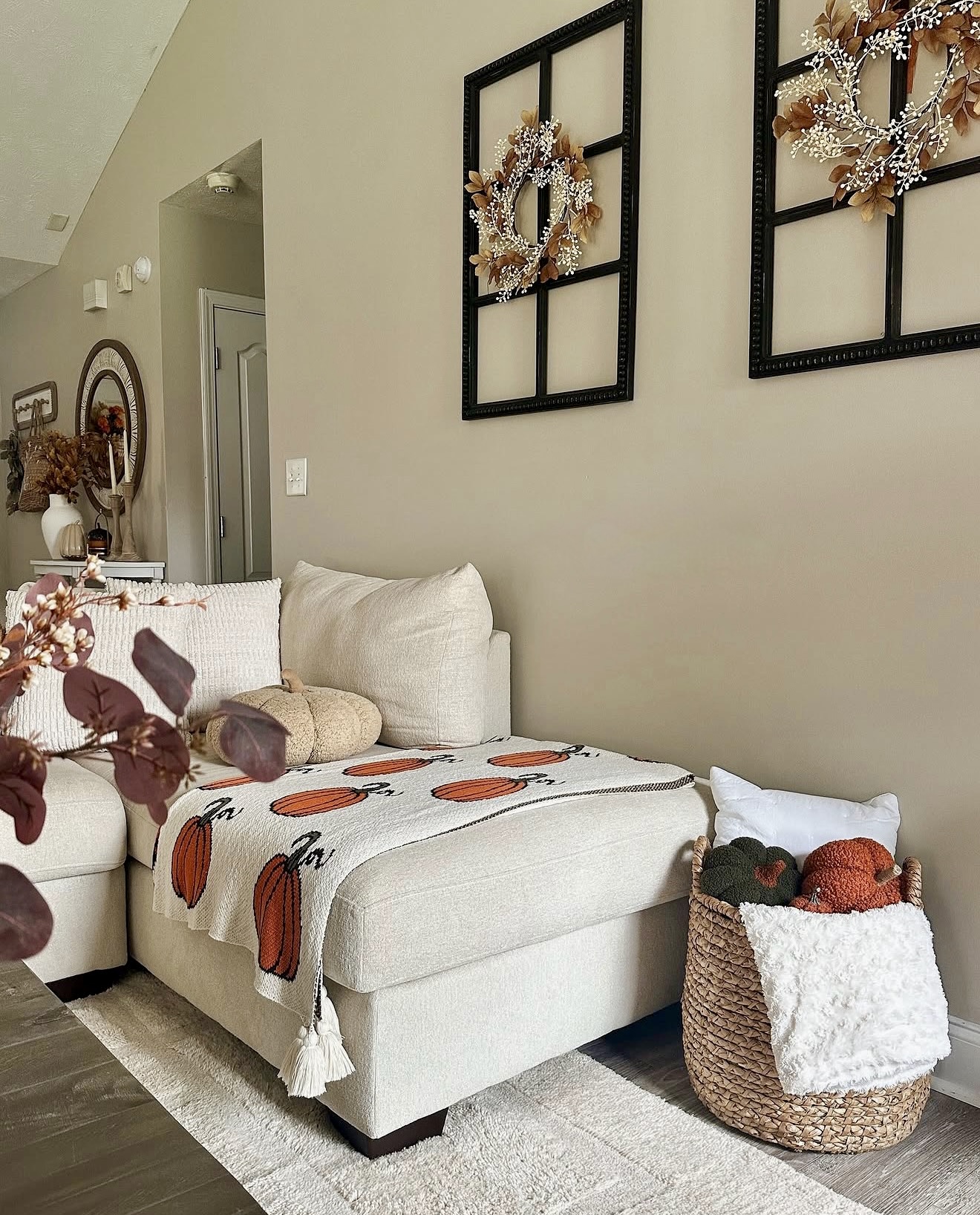 Cozy Cream Sectional With Pumpkin Accents