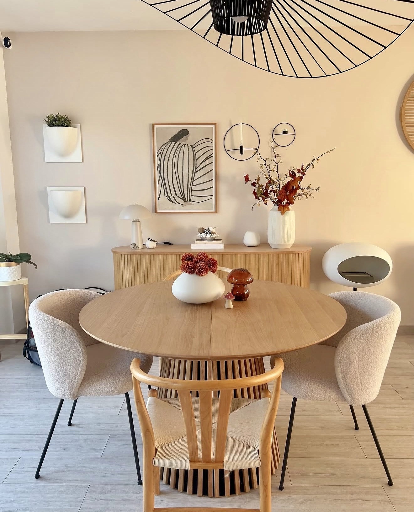 Round Wood Dining Table with Boucle Chairs