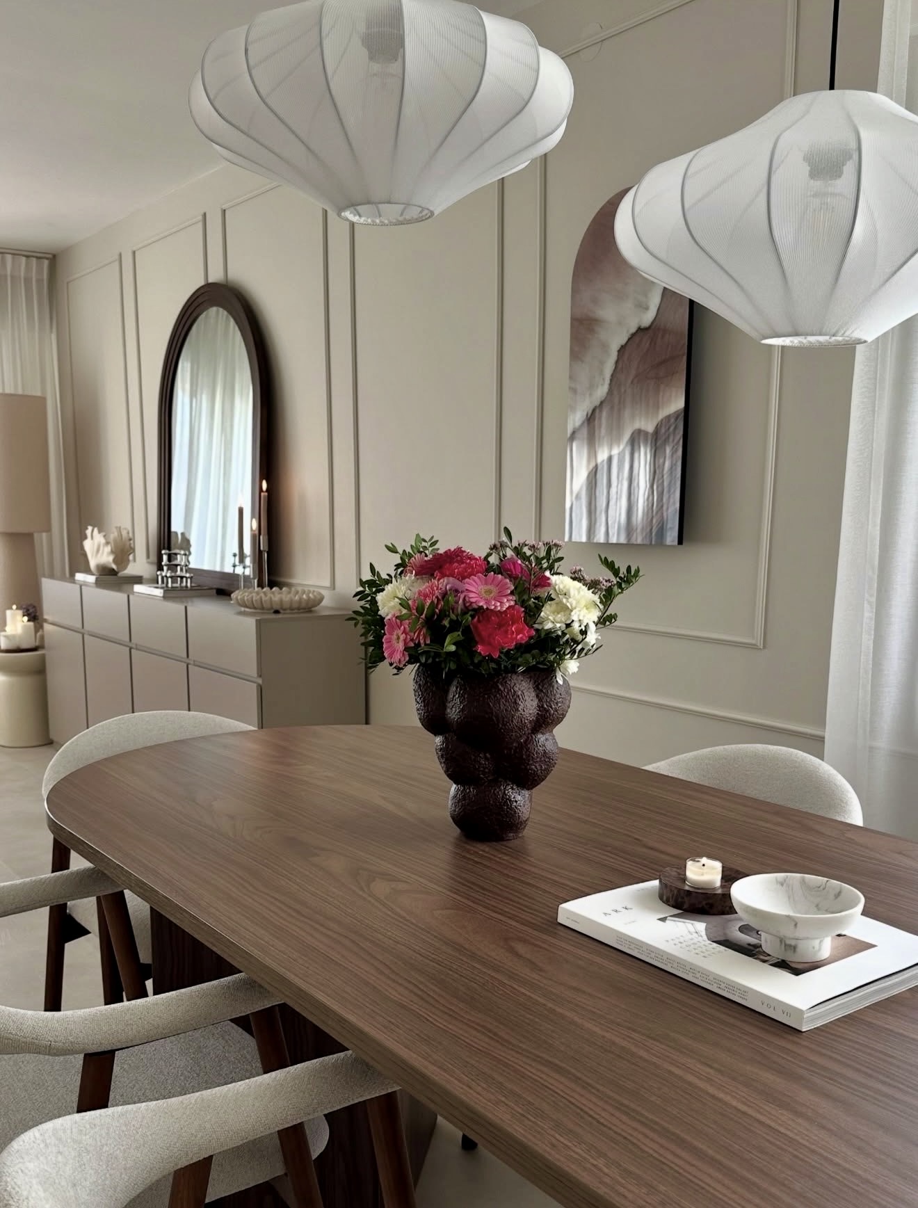 Warm Walnut Dining Table with Organic Decor