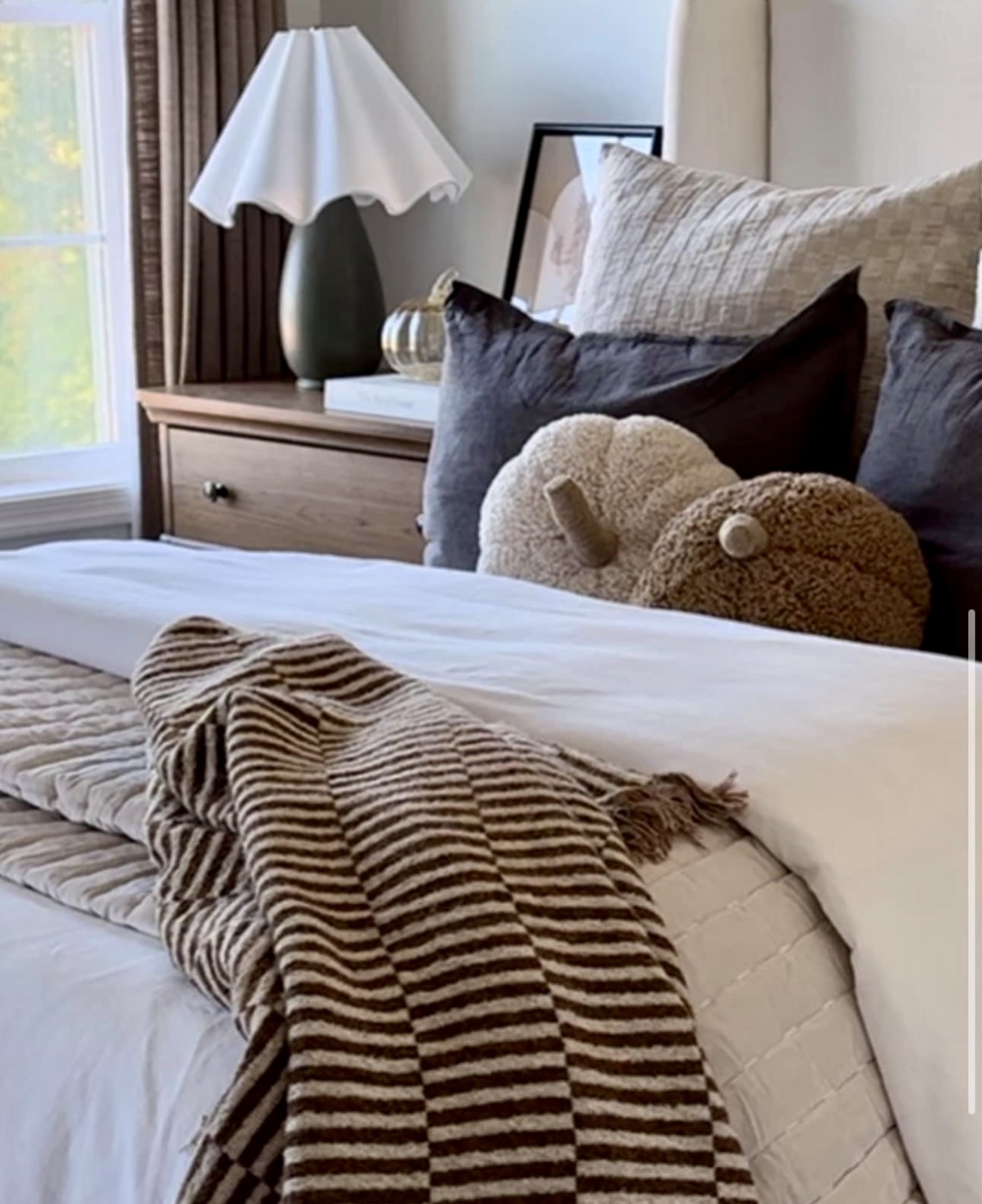 Charming Fall Bedroom with Pumpkin Pillows