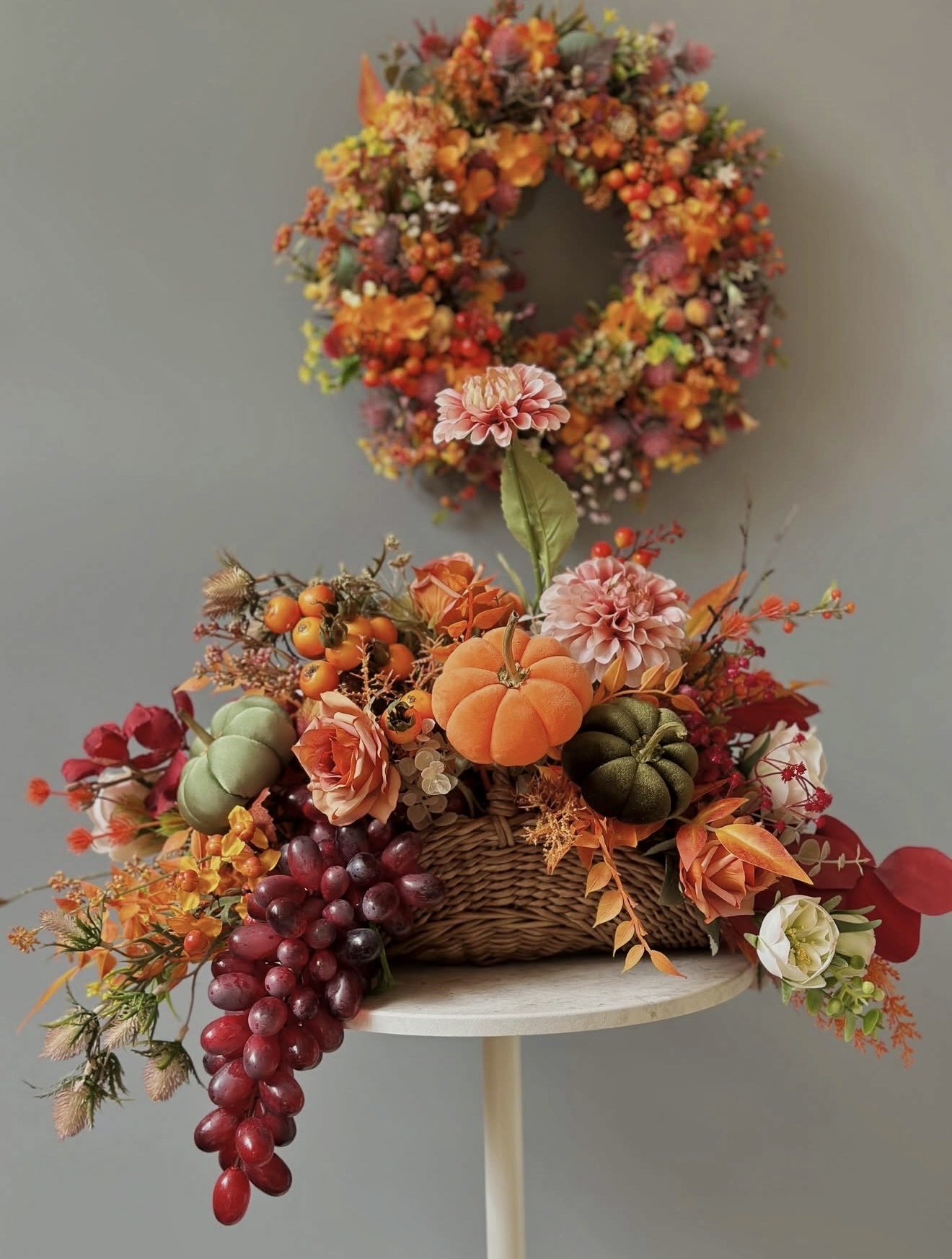 Charming Harvest Basket With Pumpkins and Grapes