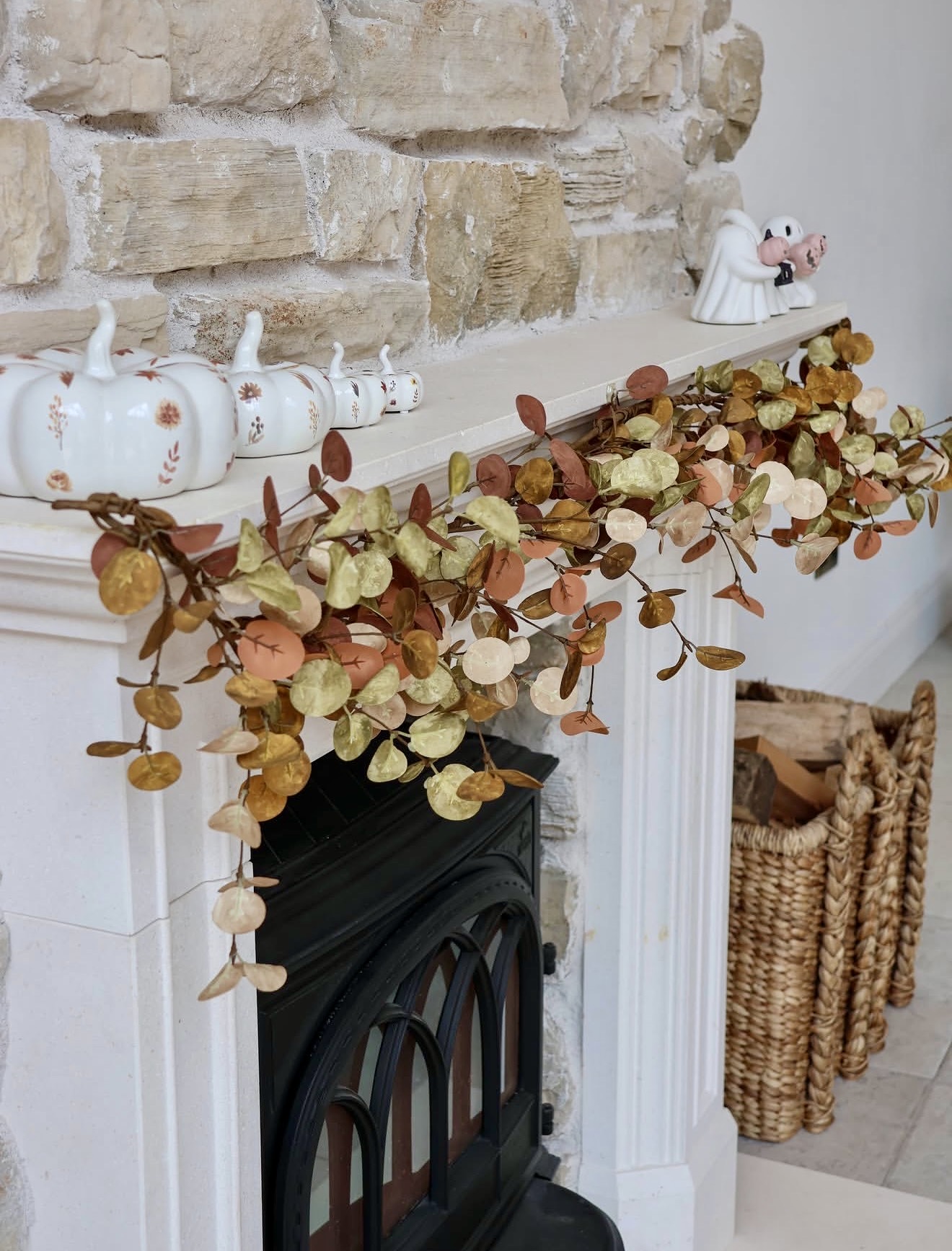 Charming White Pumpkins And Eucalyptus Garland Mantel