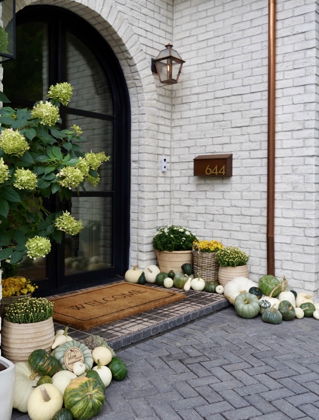 Chic Autumn Doorway With Muted Pumpkins