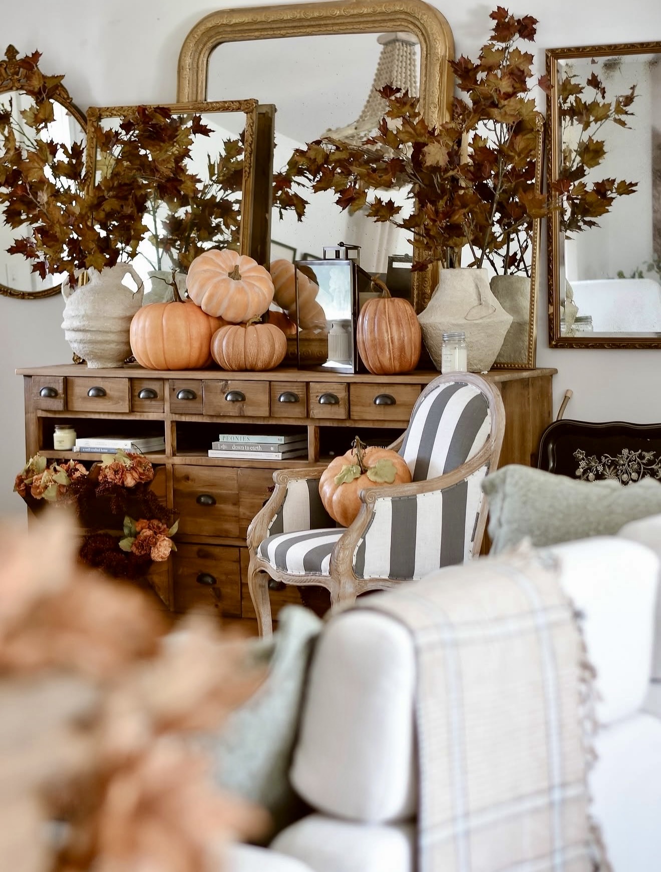 Cozy Autumn Display with Pumpkins and Fall Leaves