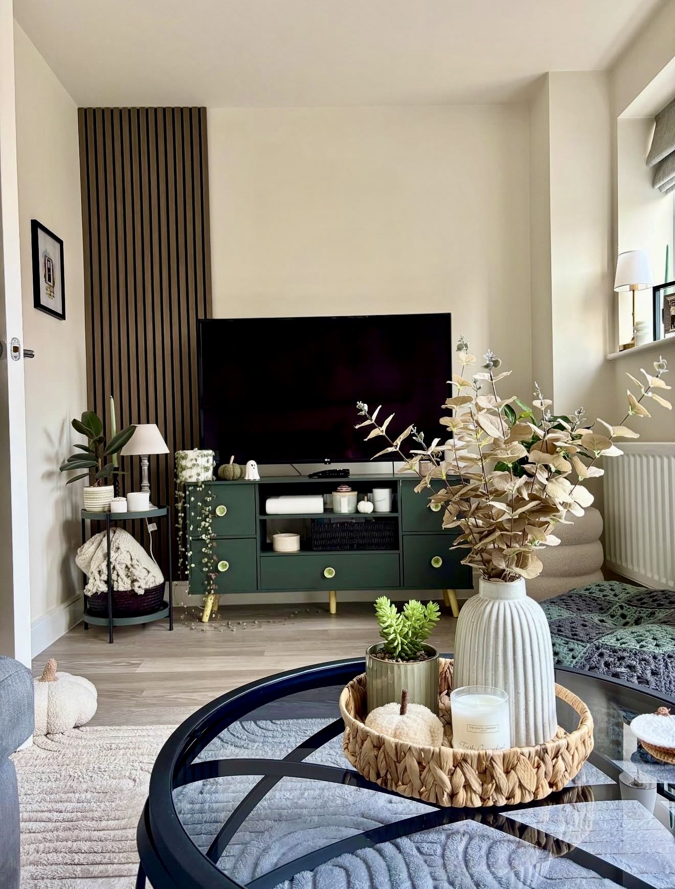 Cozy Fall Living Room with Green Accent Cabinet
