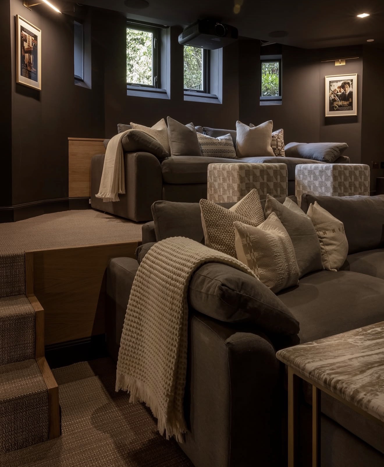 Elevated Two Tier Dark Cinema Room Layout