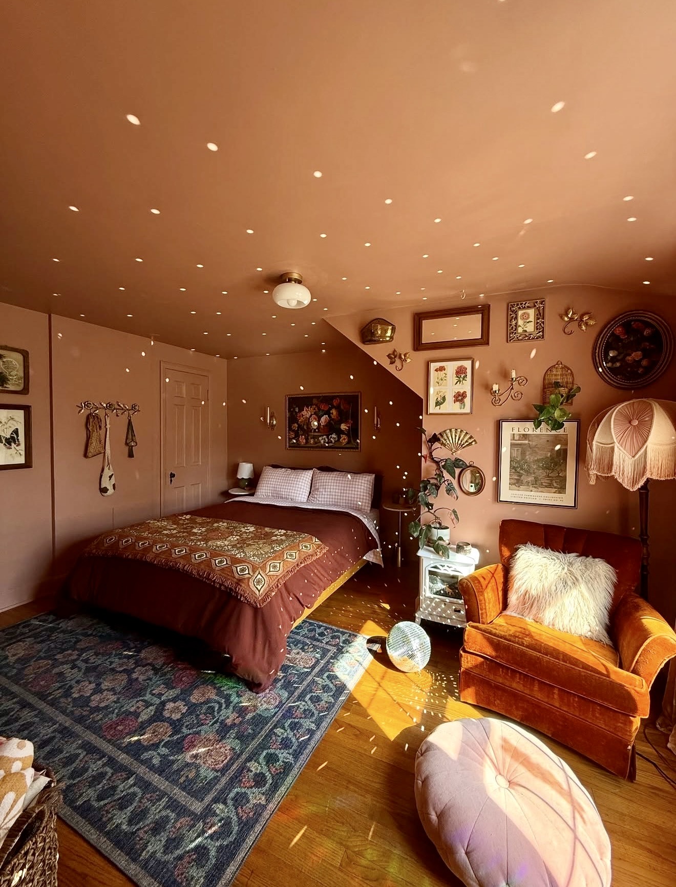 Enchanting Terracotta Bedroom With Disco Ball Lights