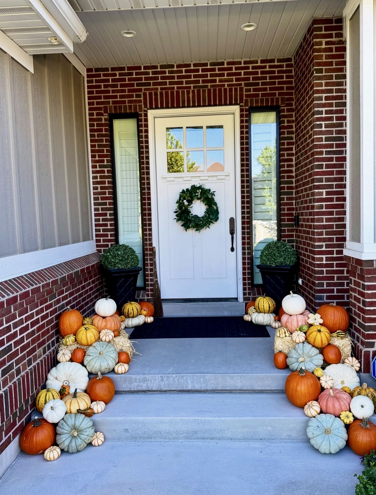 Harvest Pumpkins Cascade Down Front Steps