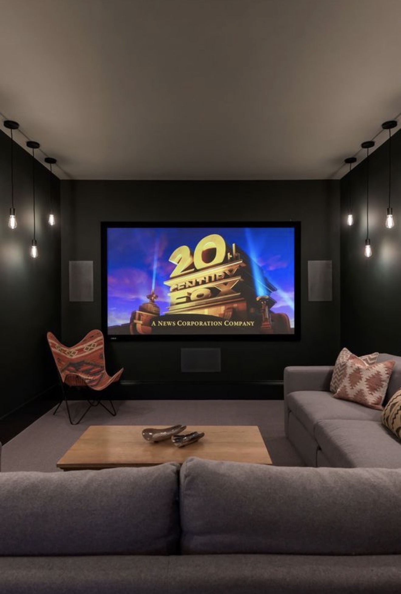 Moody Minimalist Home Cinema With Pendant Lighting