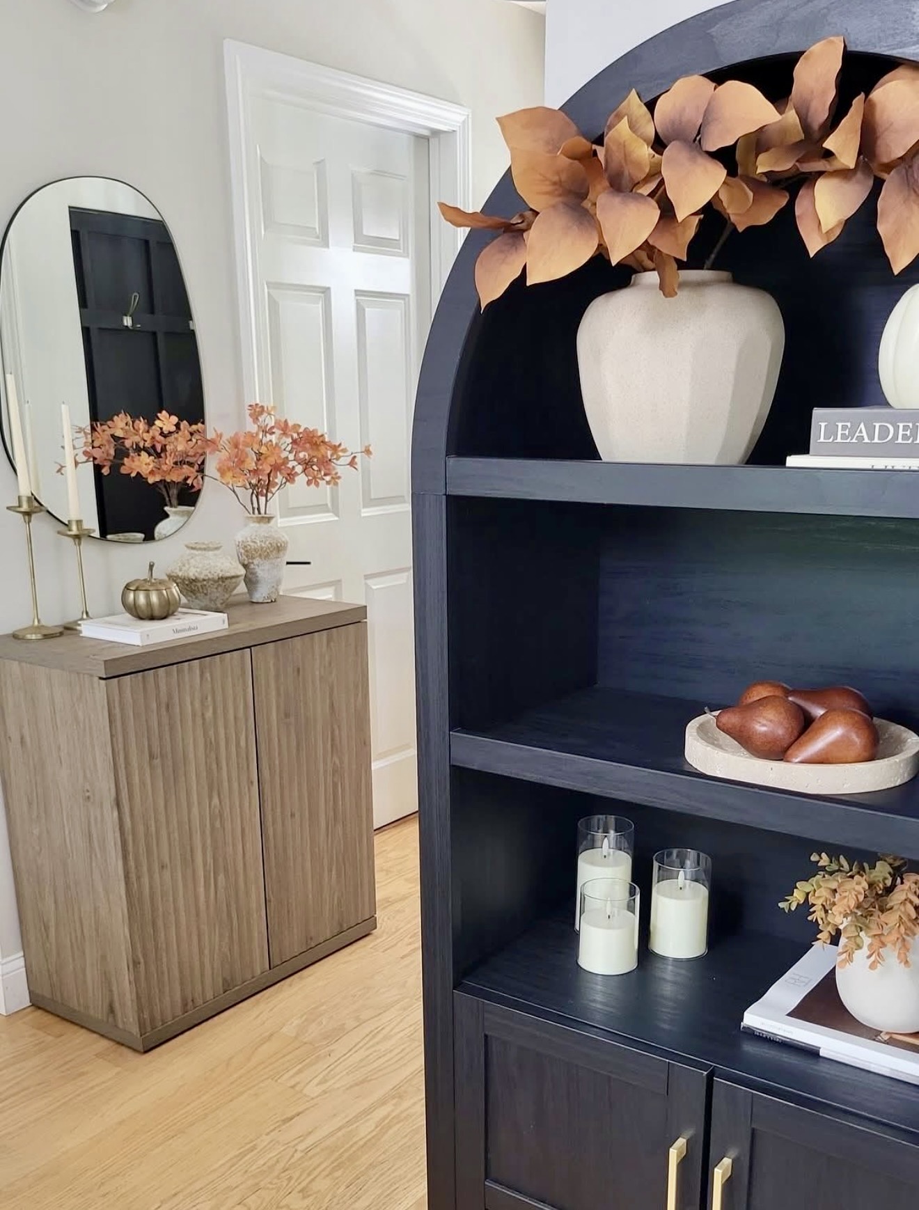 Warm Autumn Entryway With Dark Cabinet