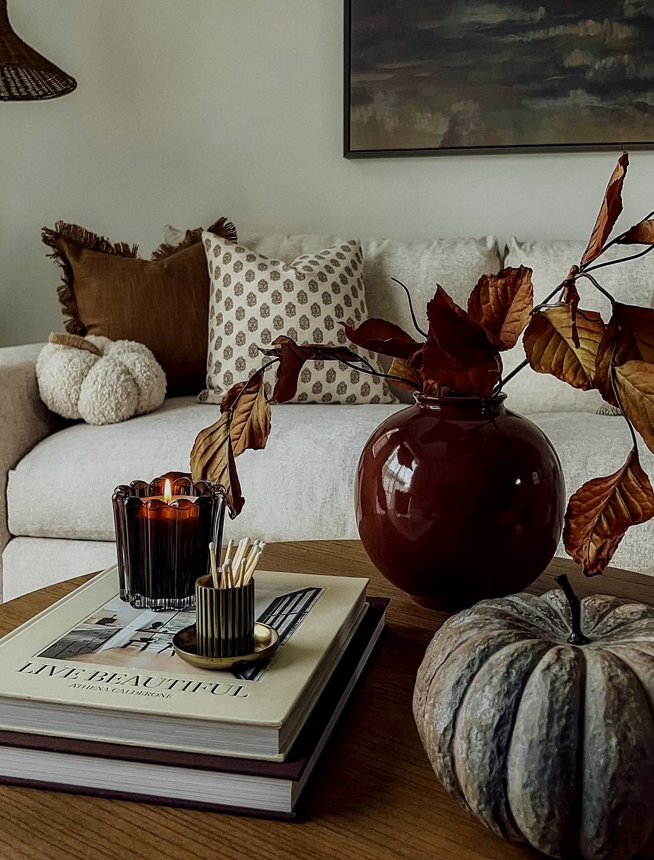 Warm Autumnal Vignette With Cozy Pillows