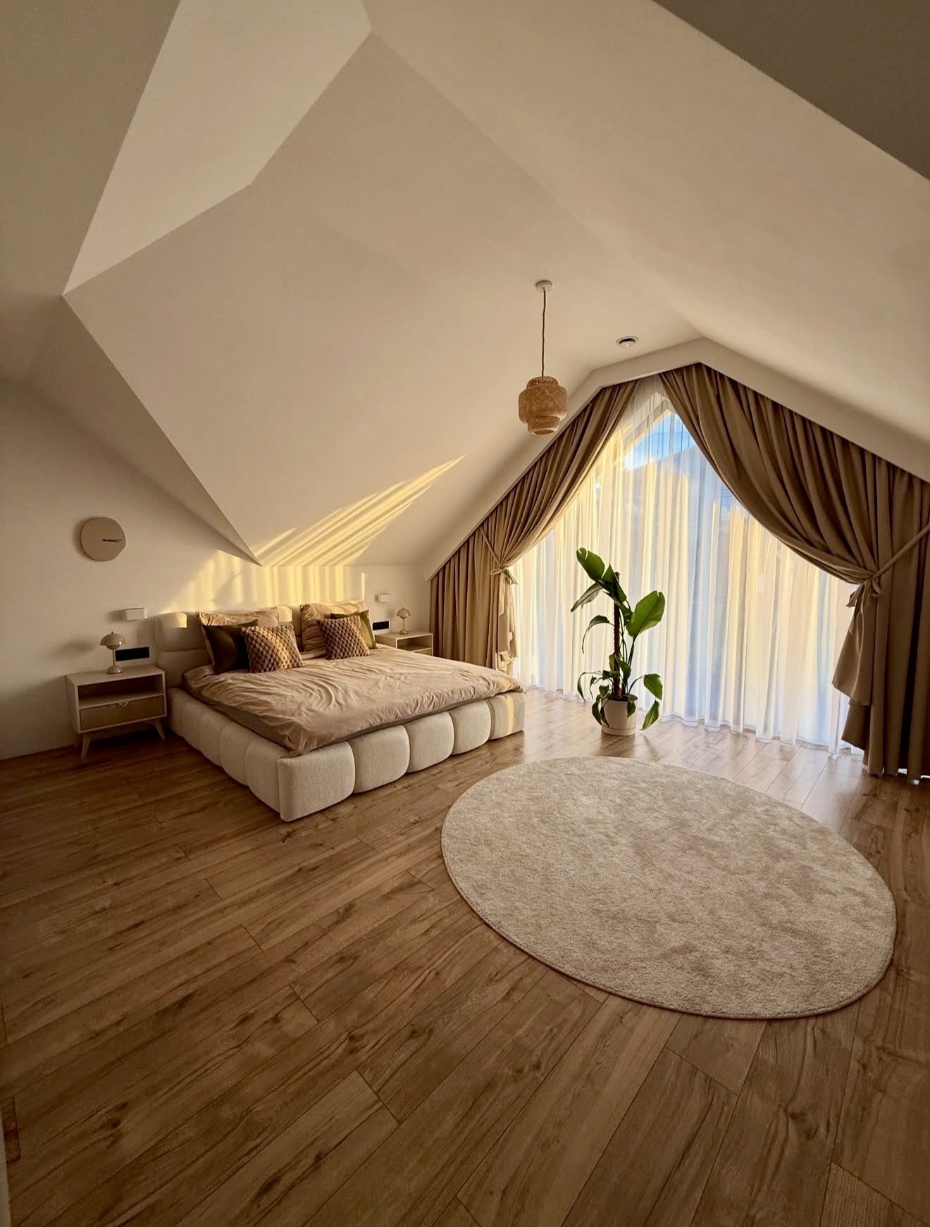 Warm & Cozy Neutral Sloped Ceiling Bedroom