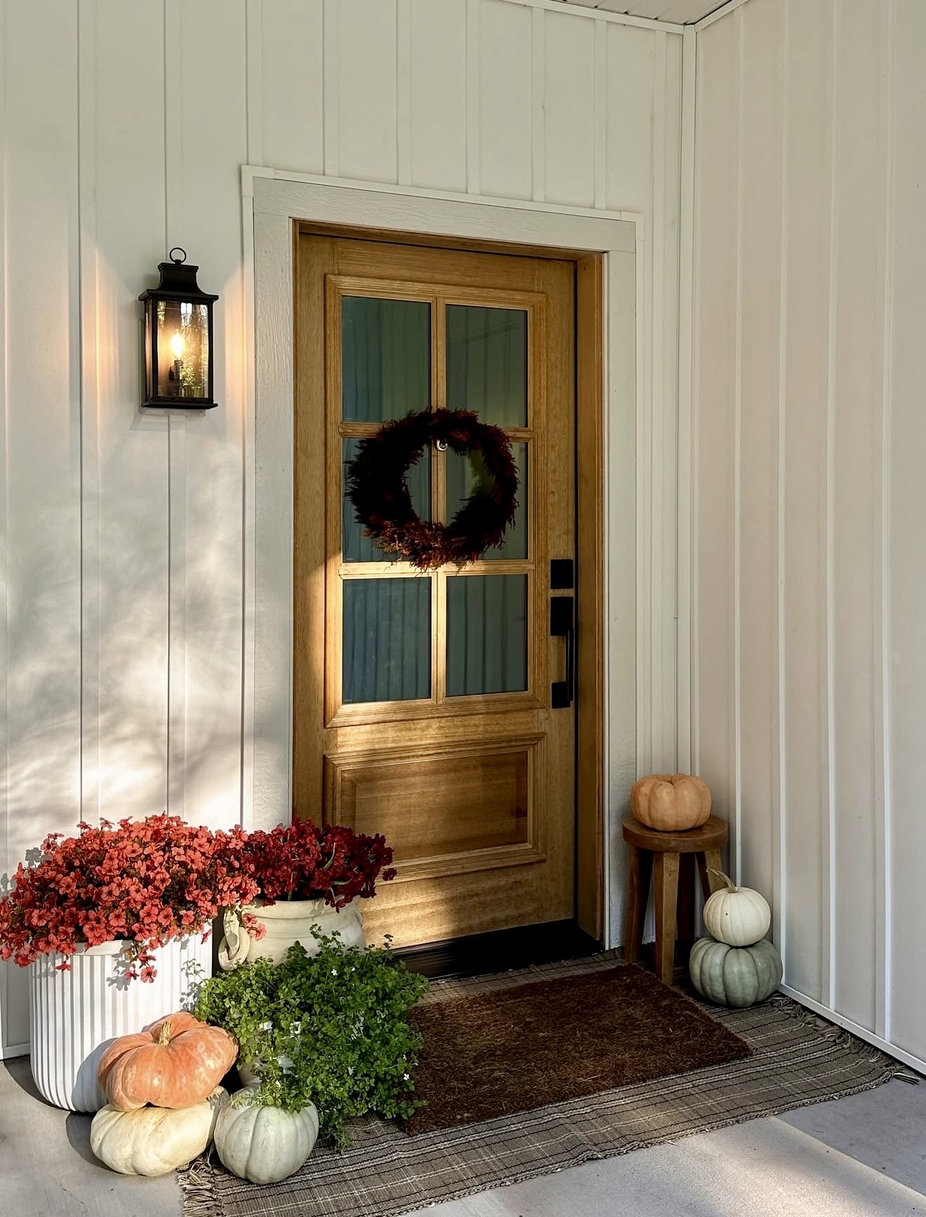 Warm Wooden Door With Autumnal Harvest Decor