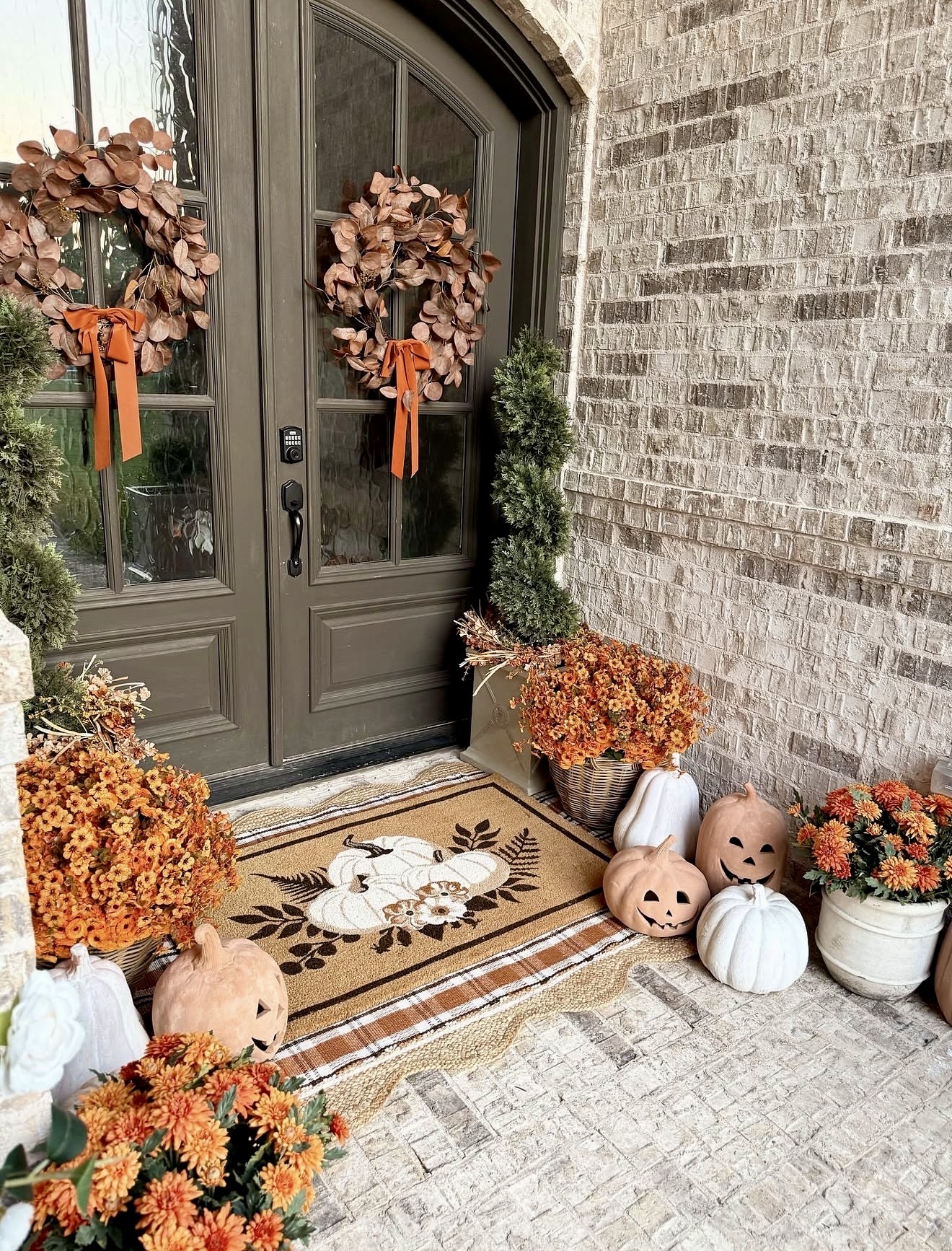 Welcoming Fall Farmhouse Porch With Pumpkins