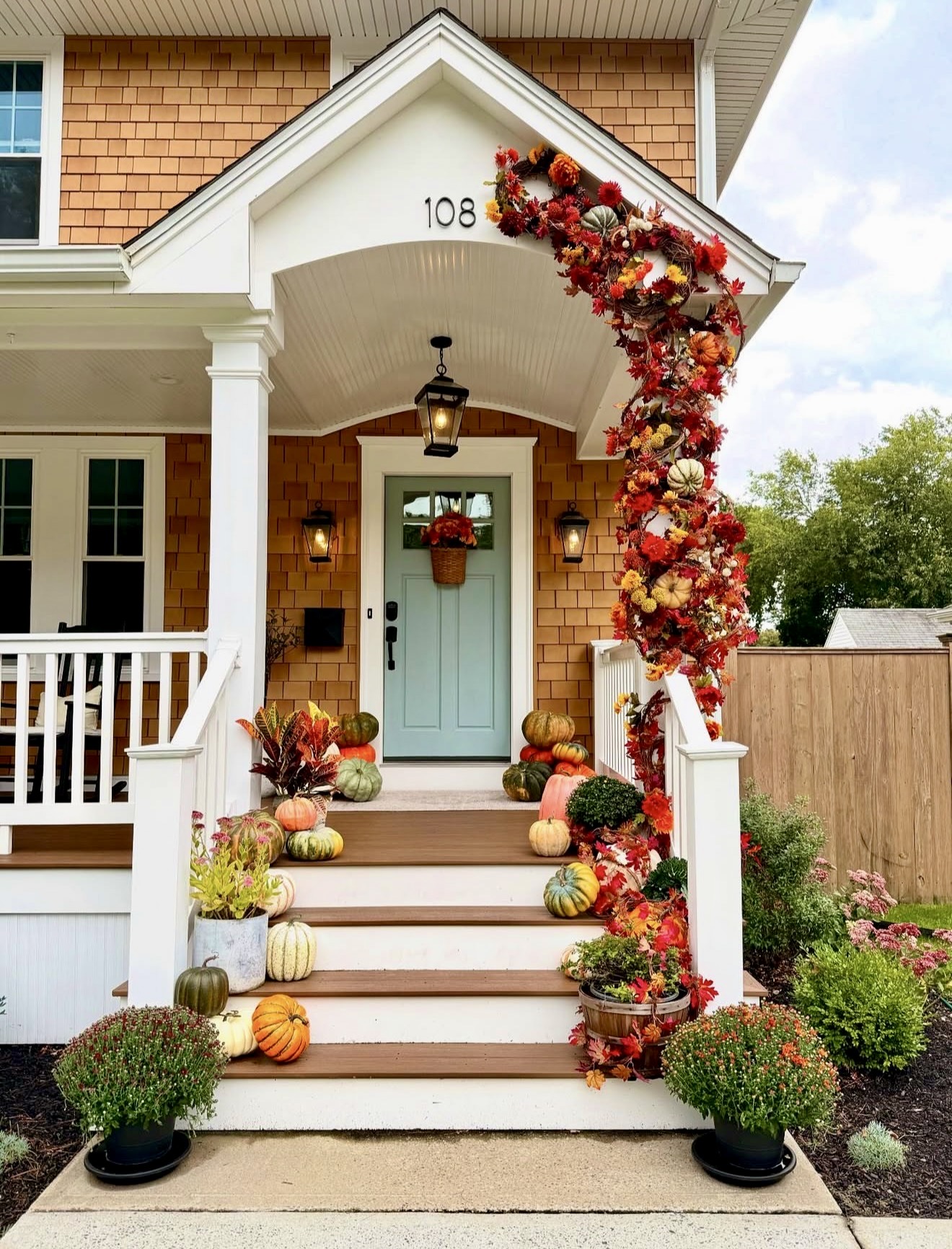 Whimsical Harvest Porch With Abundant Pumpkins