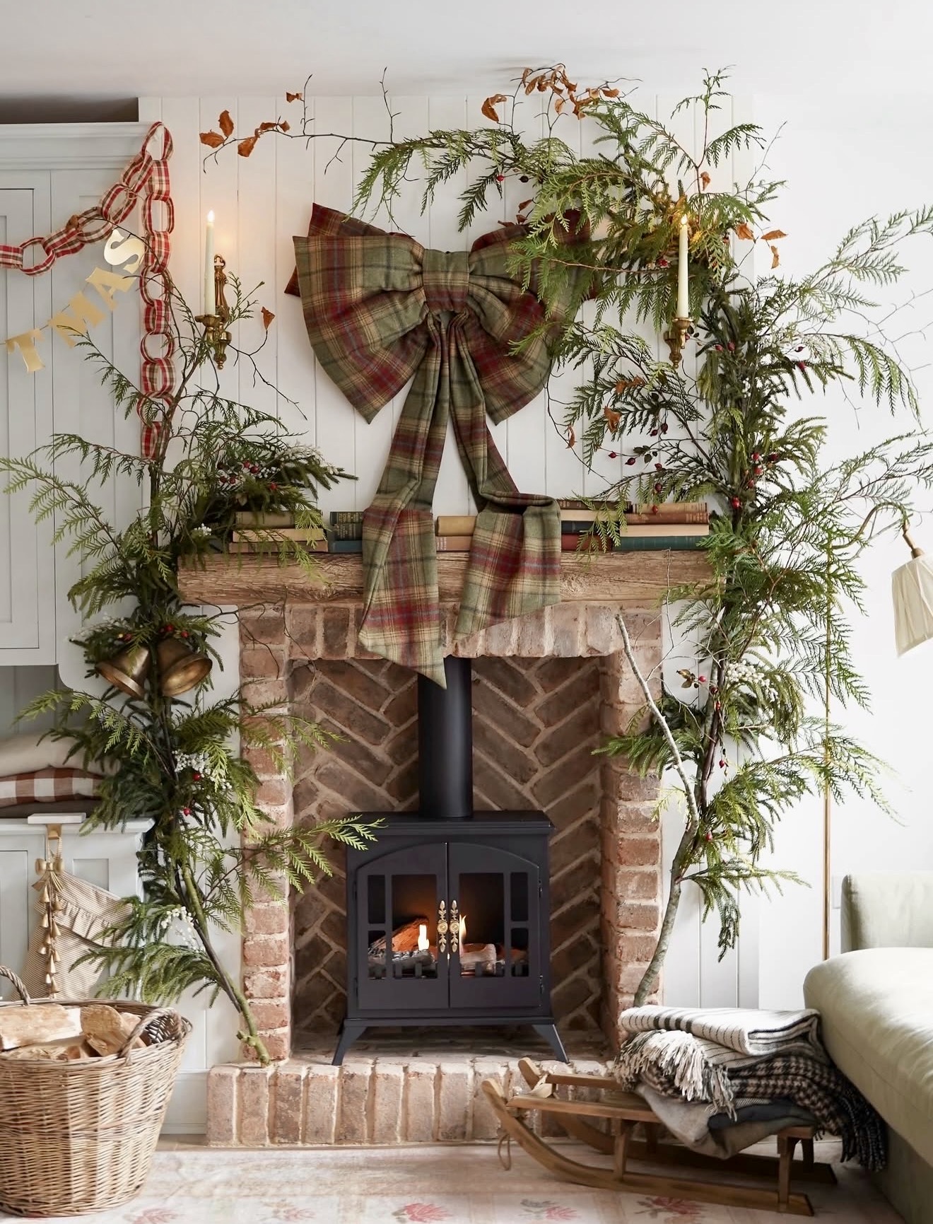 Cozy Rustic Brick Fireplace With Plaid Christmas Decor