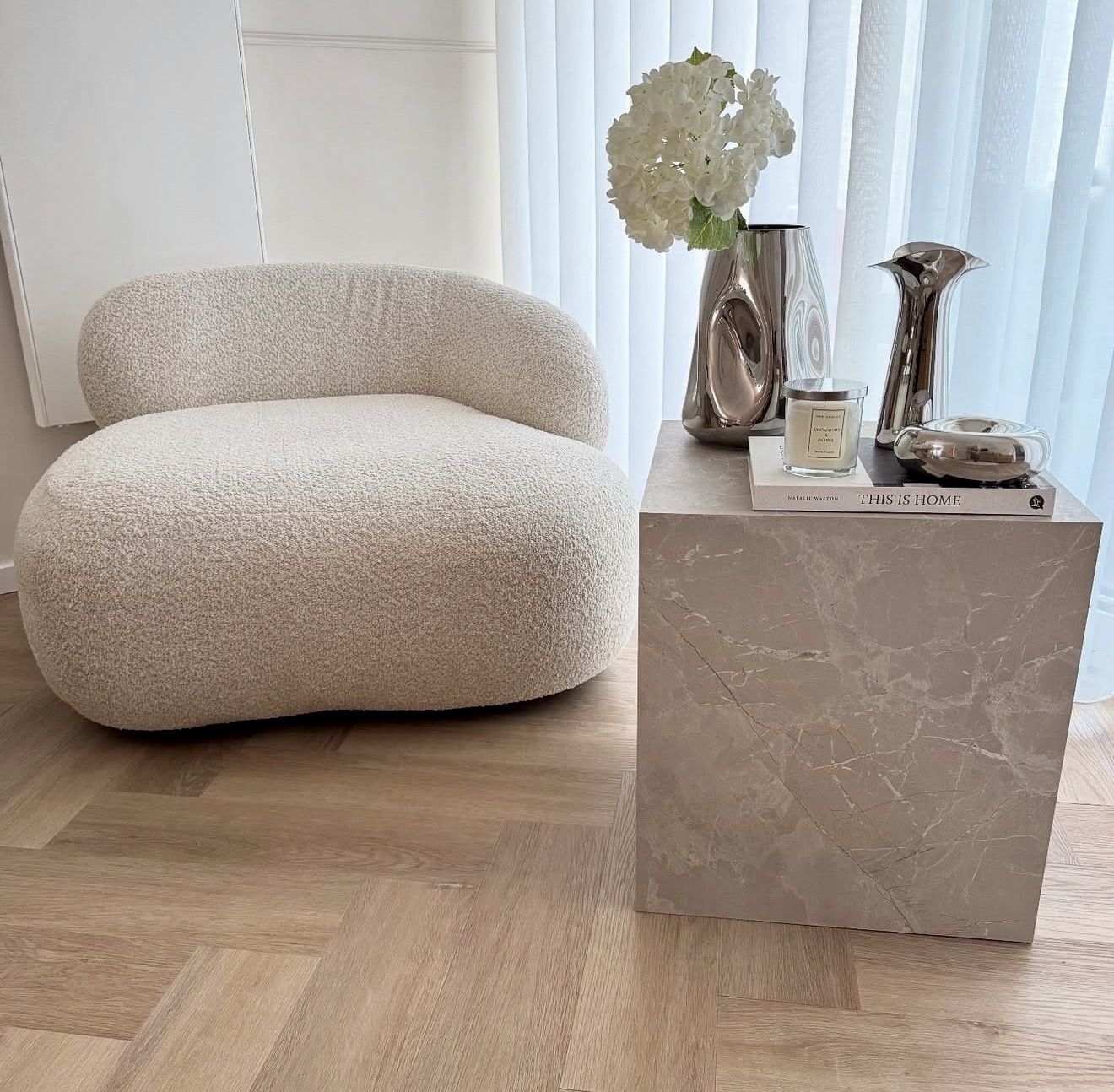 Curved Boucle Chair With Chrome Accent Details