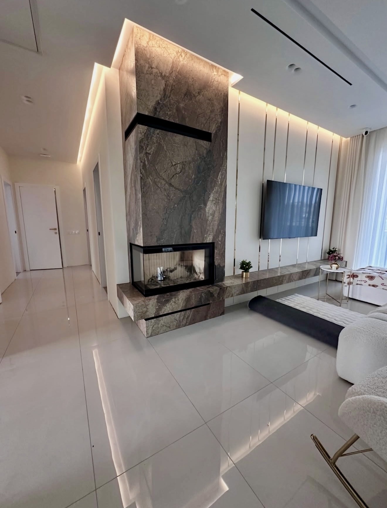 Dramatic Marble Fireplace with Modern Accents