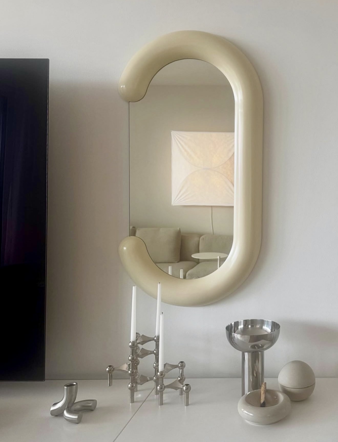 Minimalist Cream Mirror With Sleek Chrome Accents
