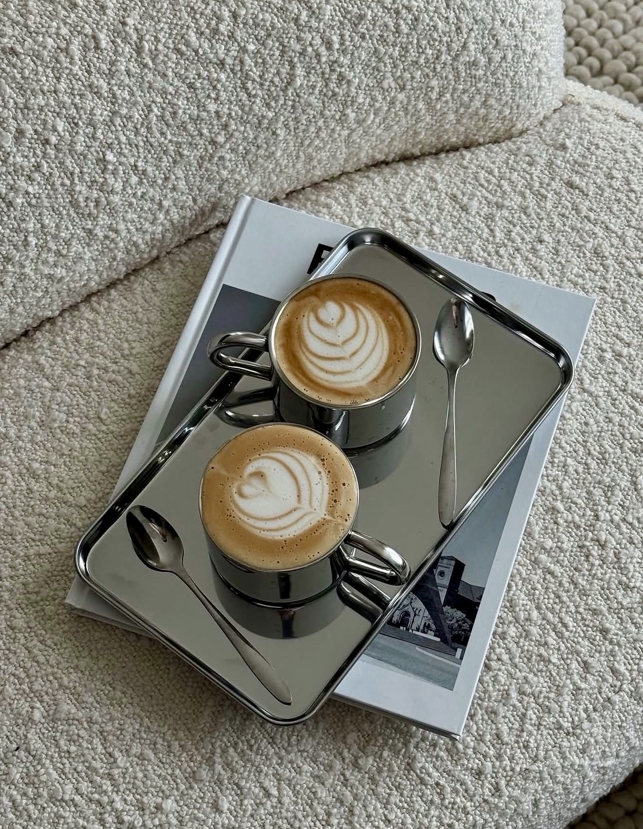 Reflective Chrome Coffee Set On Textured Cream Seating
