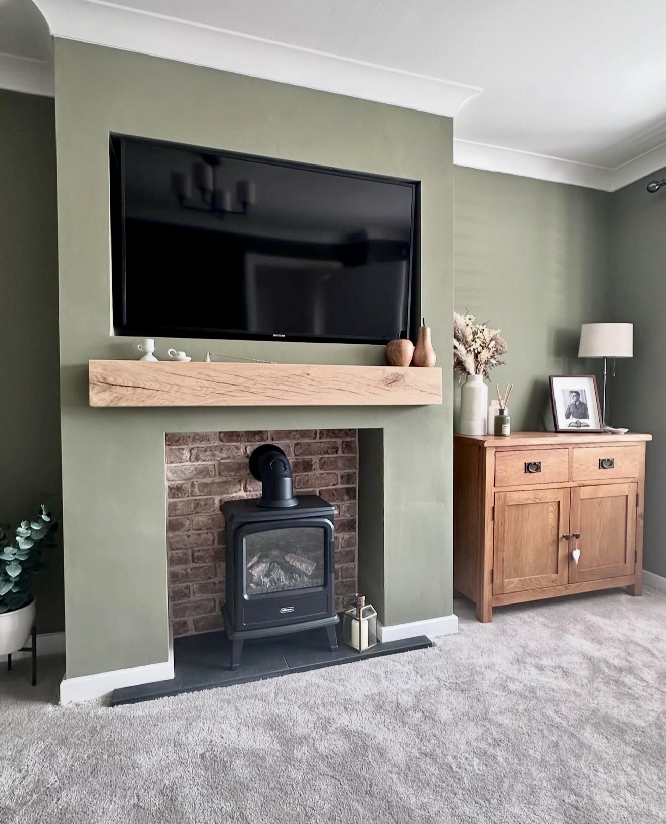 Sage Green Fireplace With Rustic Wood Mantle