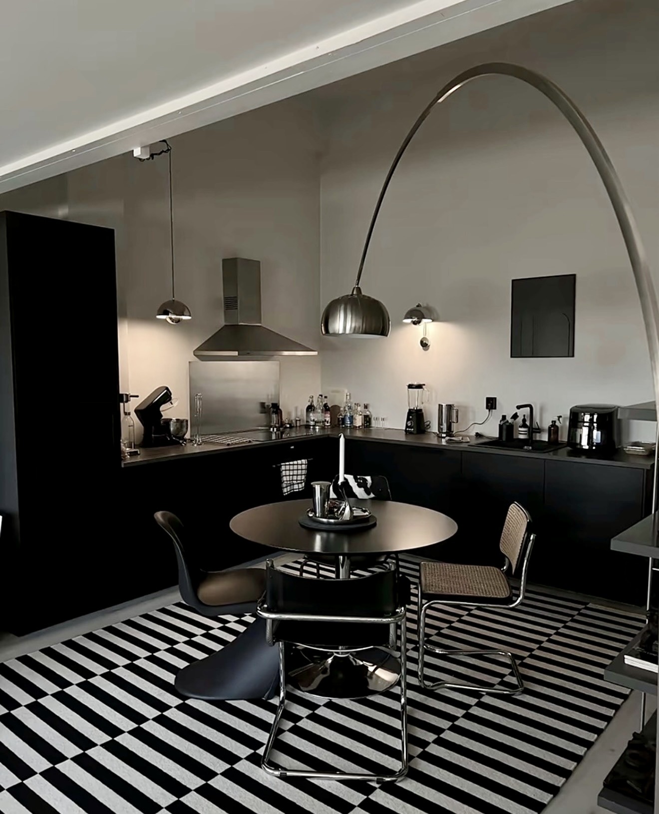 Sleek Monochrome Kitchen With Polished Chrome Accents