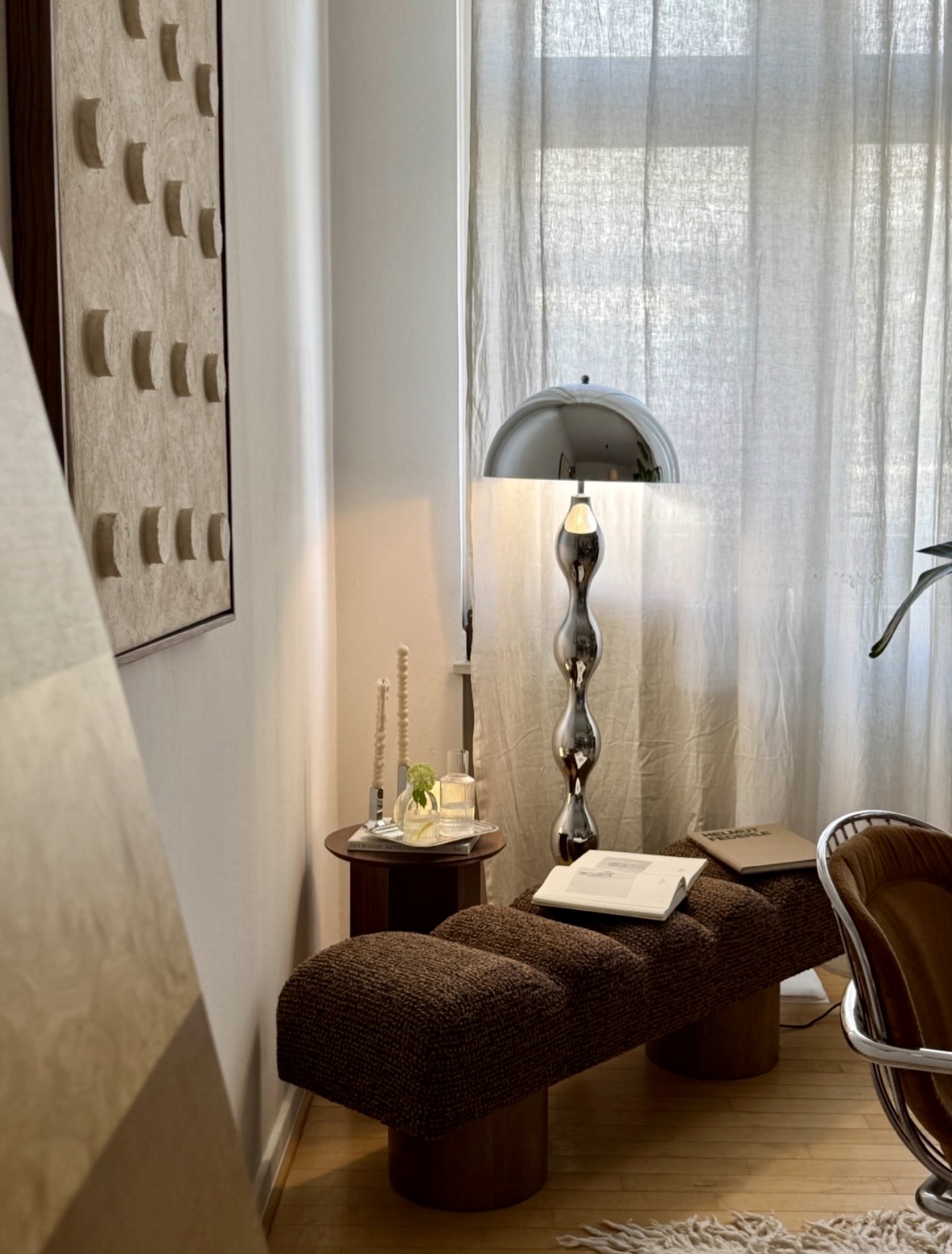 Sophisticated Chrome Accent Lighting In Cozy Nook