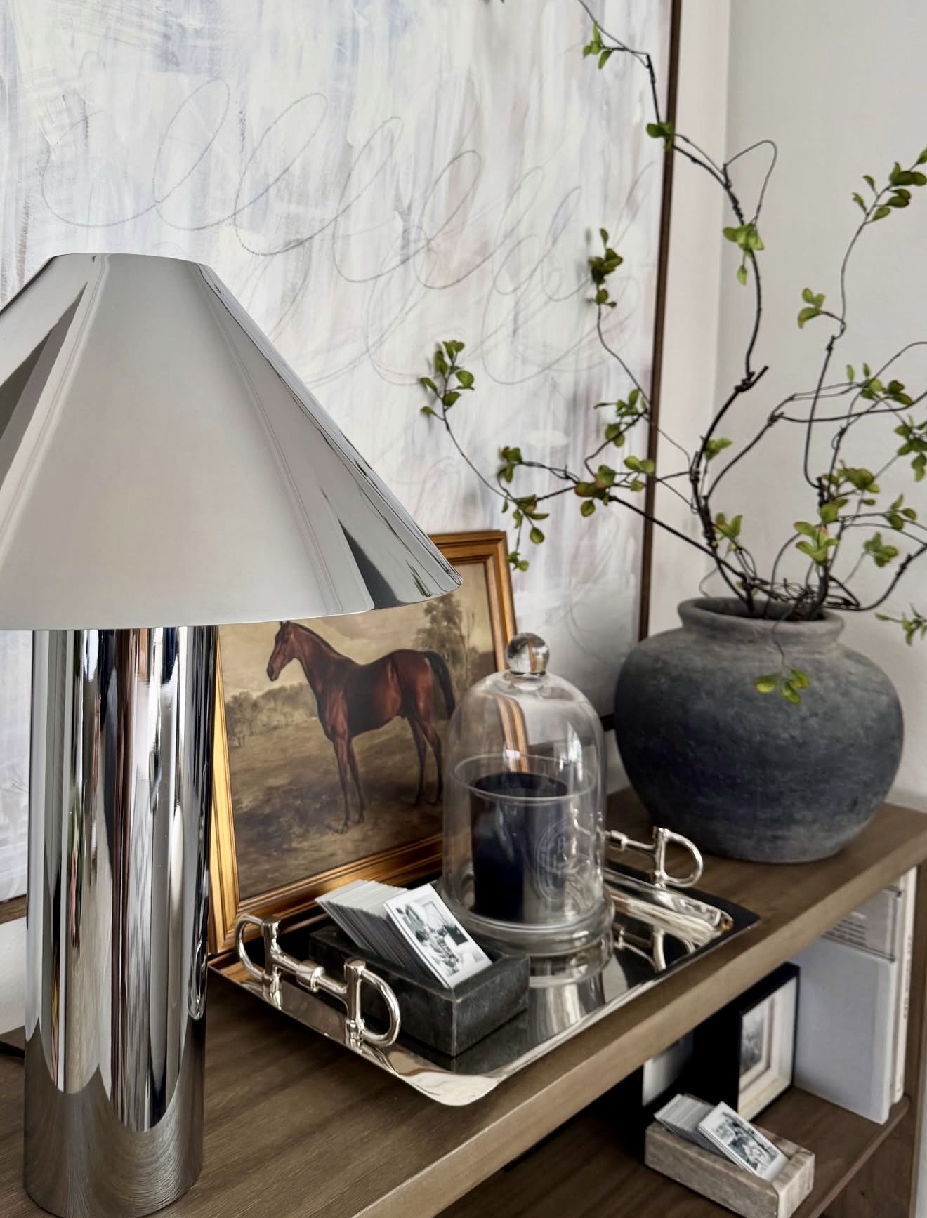 Sophisticated Chrome Accents In A Neutral Console Display