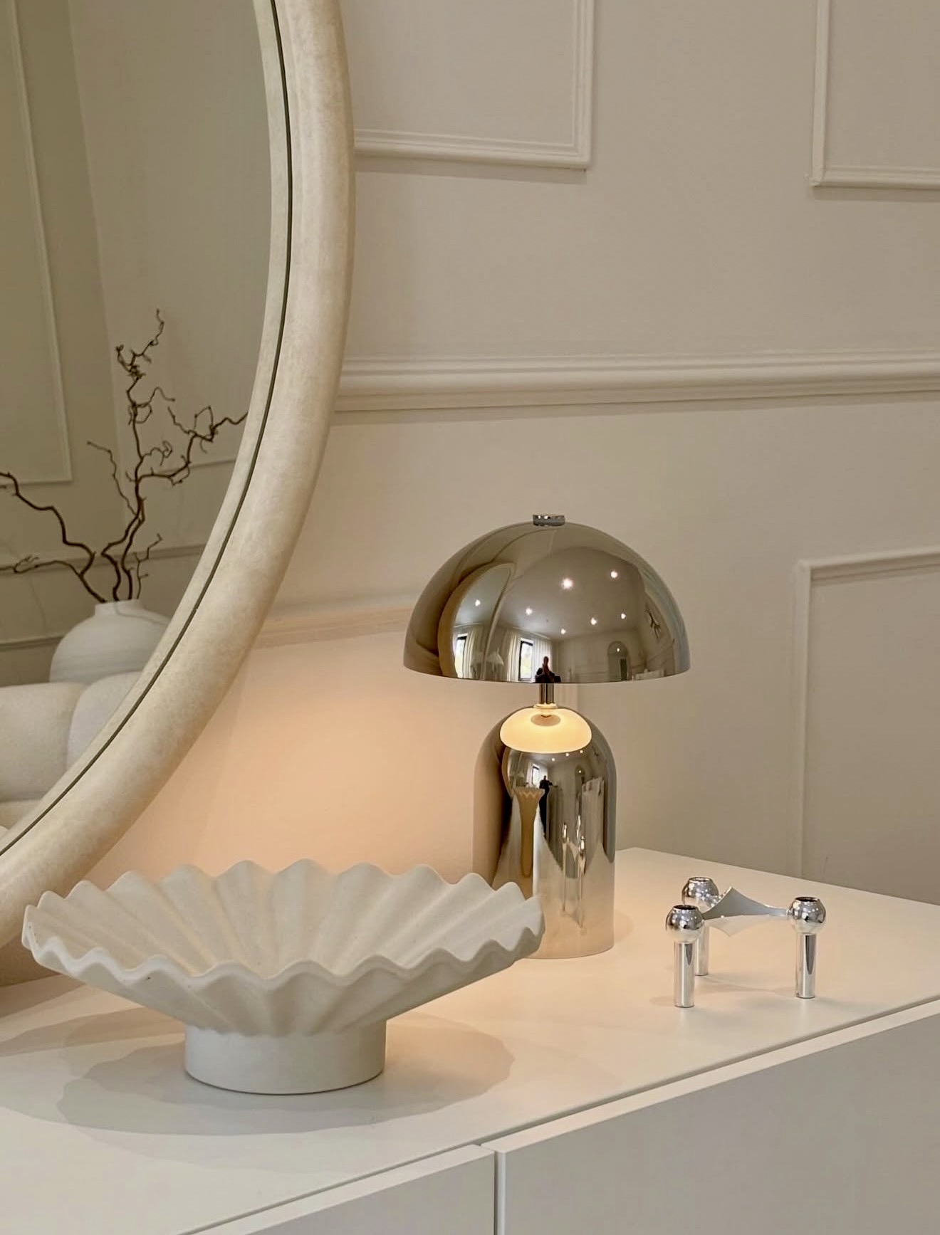 Sophisticated Chrome Accents In Neutral Spaces