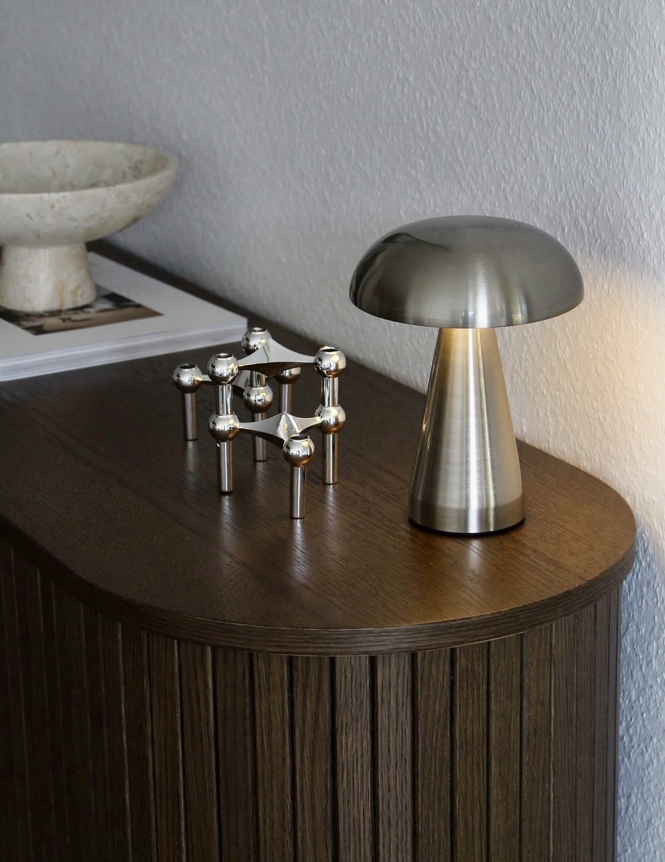 Sophisticated Dark Wood And Chrome Console Styling