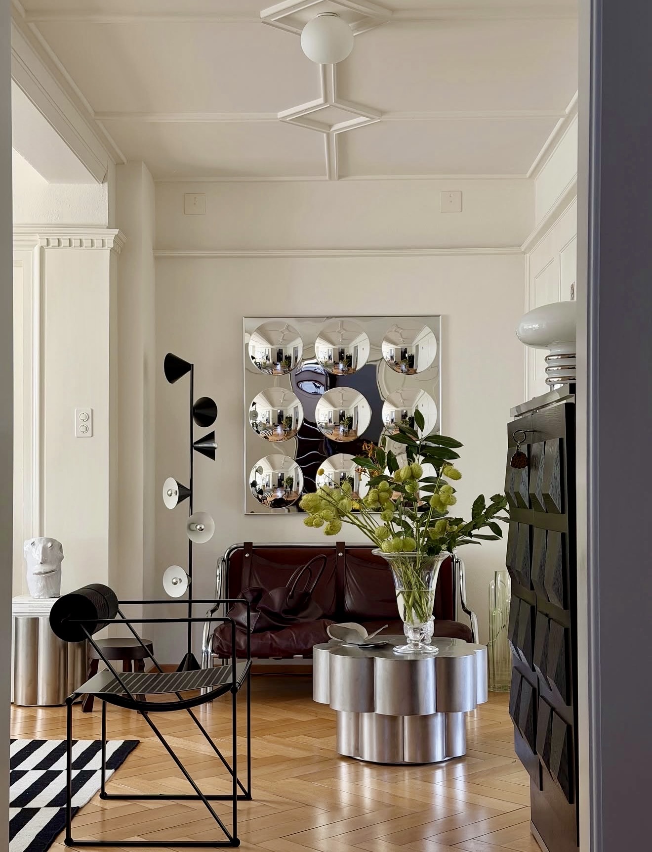 Sophisticated Living Room With Chrome Accents