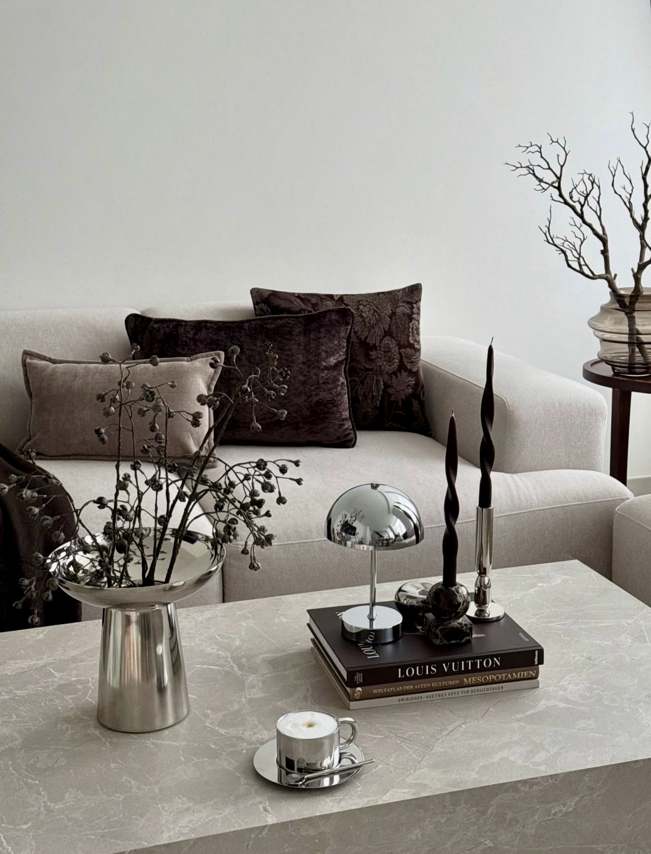 Sophisticated Living Room With Chrome Accents