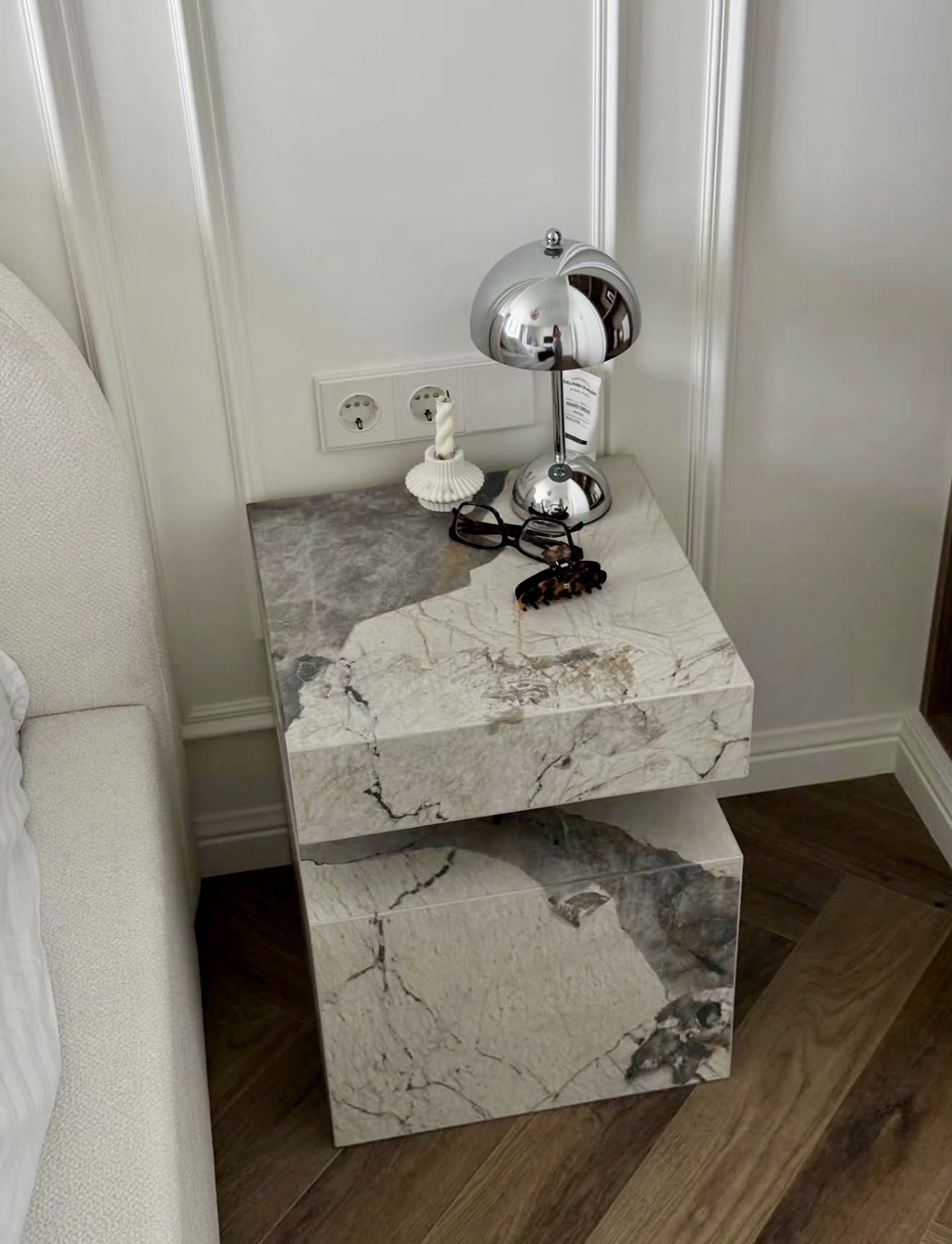 Sophisticated Marble And Chrome Bedside Vignette