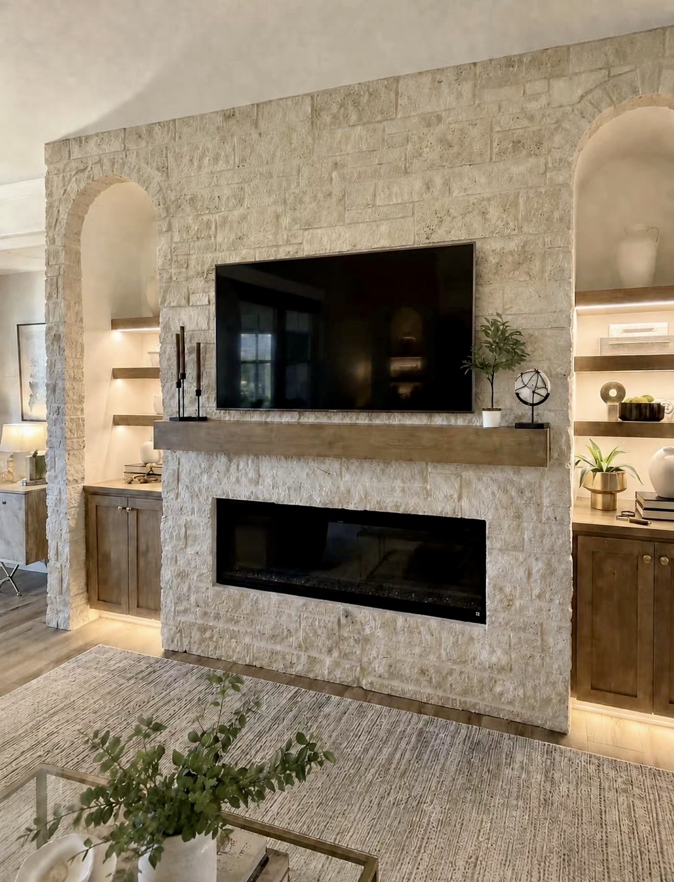 Textured Stone Fireplace with Integrated Shelving